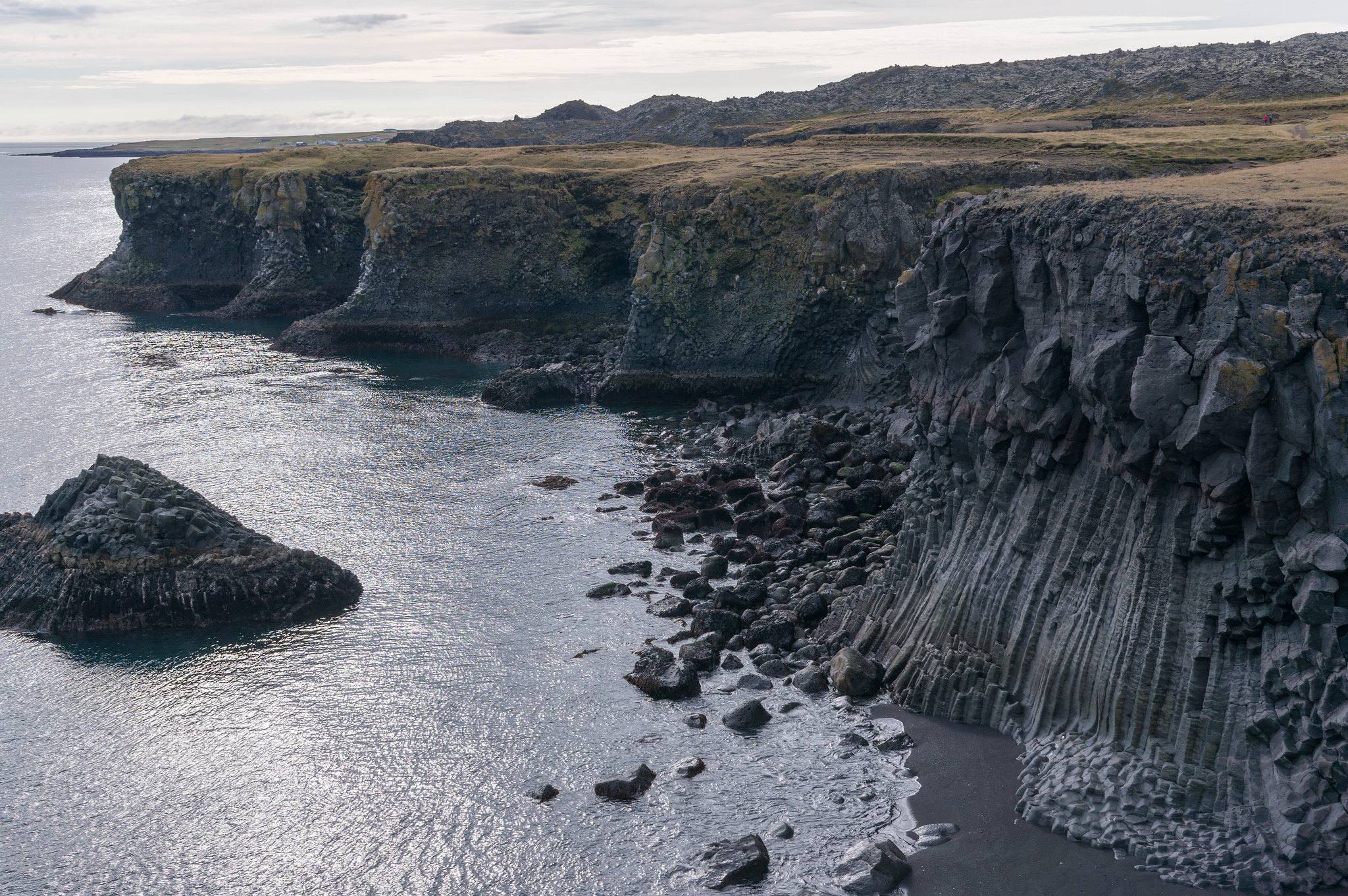 Basalt cliffs and the sea arch on the Arnarstapi coastline